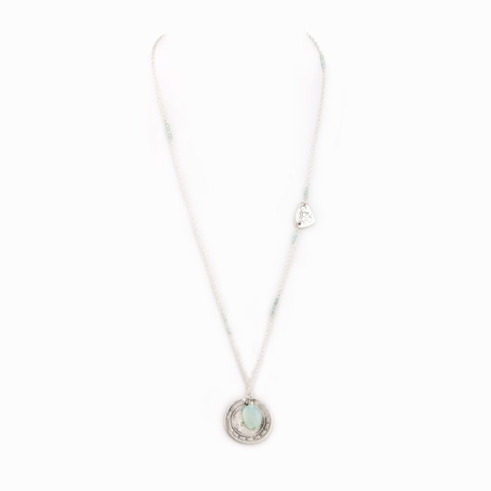 A simple necklace with delicate sterling silver chain, stamped silver coin charm, and aquamarine crystal.