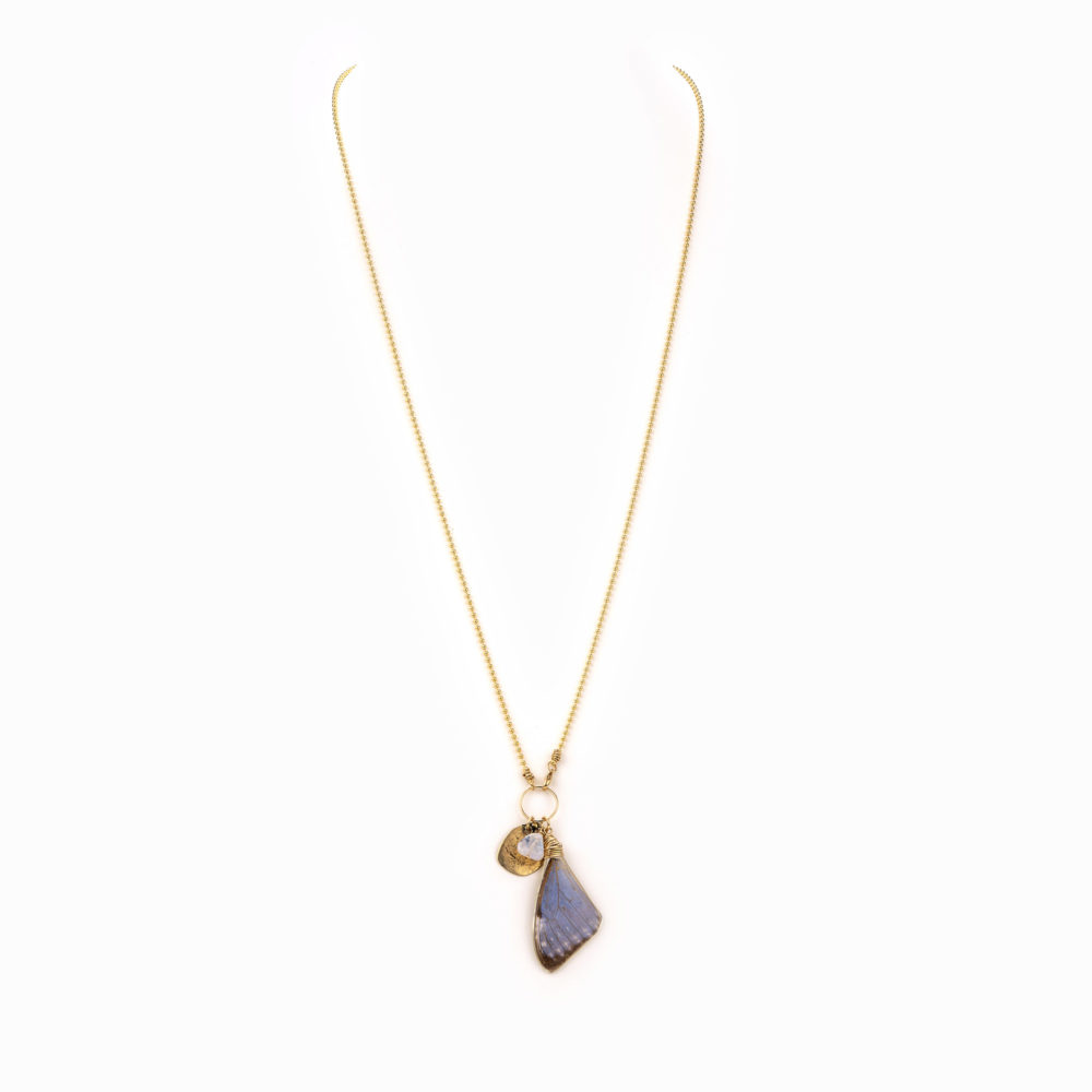 A delicate and thin gold ball chain with purple butterflywing charm.