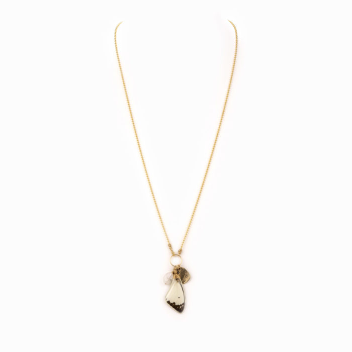 A delicate and thin gold ball chain with white butterflywing charm.