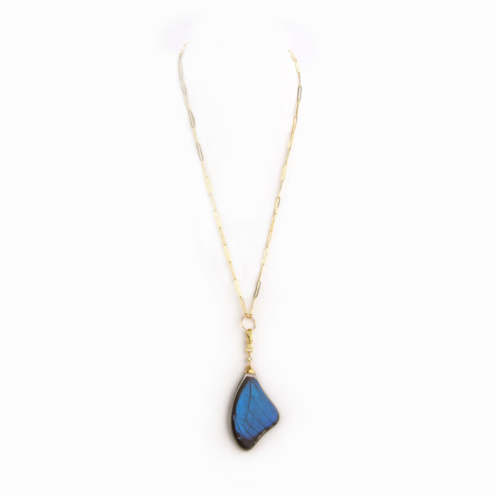 A delicate and thin 14k gold-filled paper clip chain nekclace with electric blue butterfly wing charm.