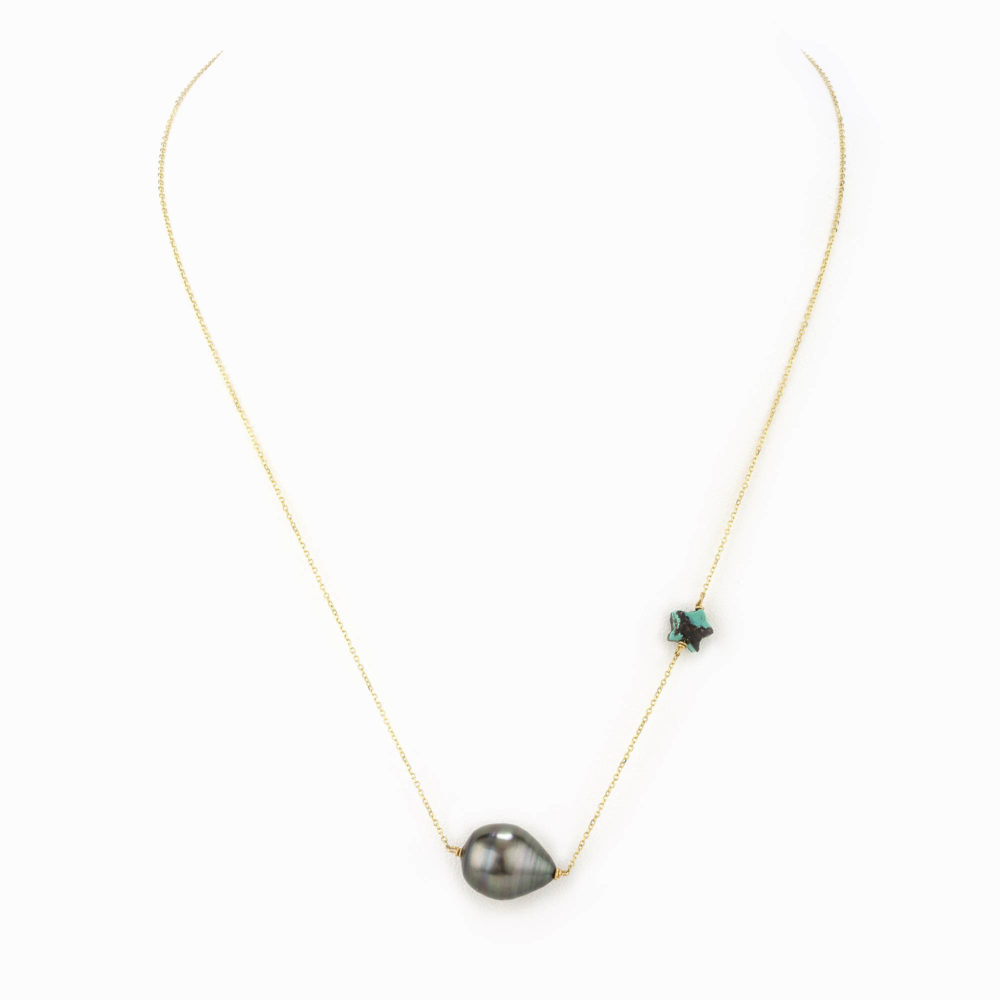 A 14k gold fill chain necklace with a turquoise star and a black pearl.