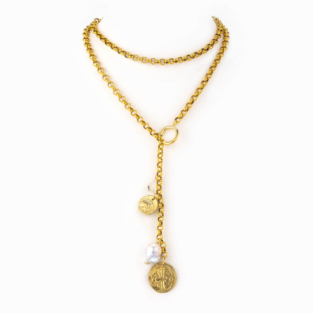 A solid brass rolo chain necklace with an oversized clasp doubled up and finshed with a large baroque pearl, small moon stone, and brass antique coin charms.