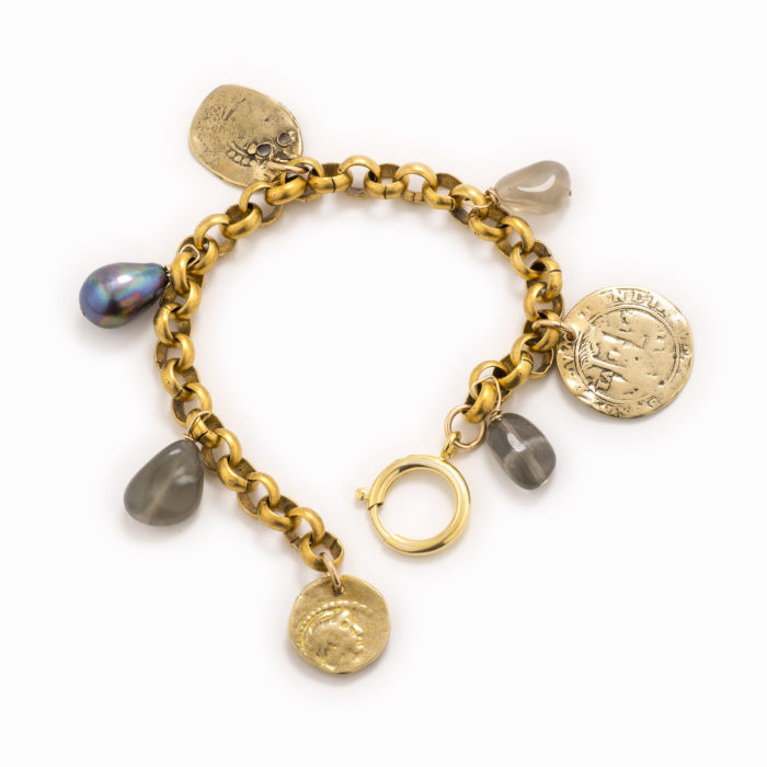 An adjustable, brass rolo chain bracelet with black pearls, gold coins and smoky quartz.