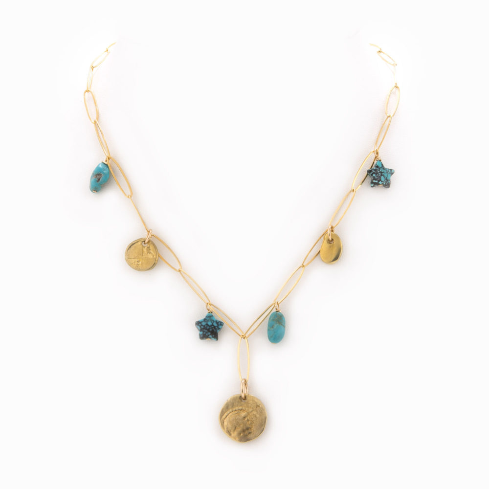An adjustable 14k gold-filled paperclip chain necklace with brass coins and turquoise charms.