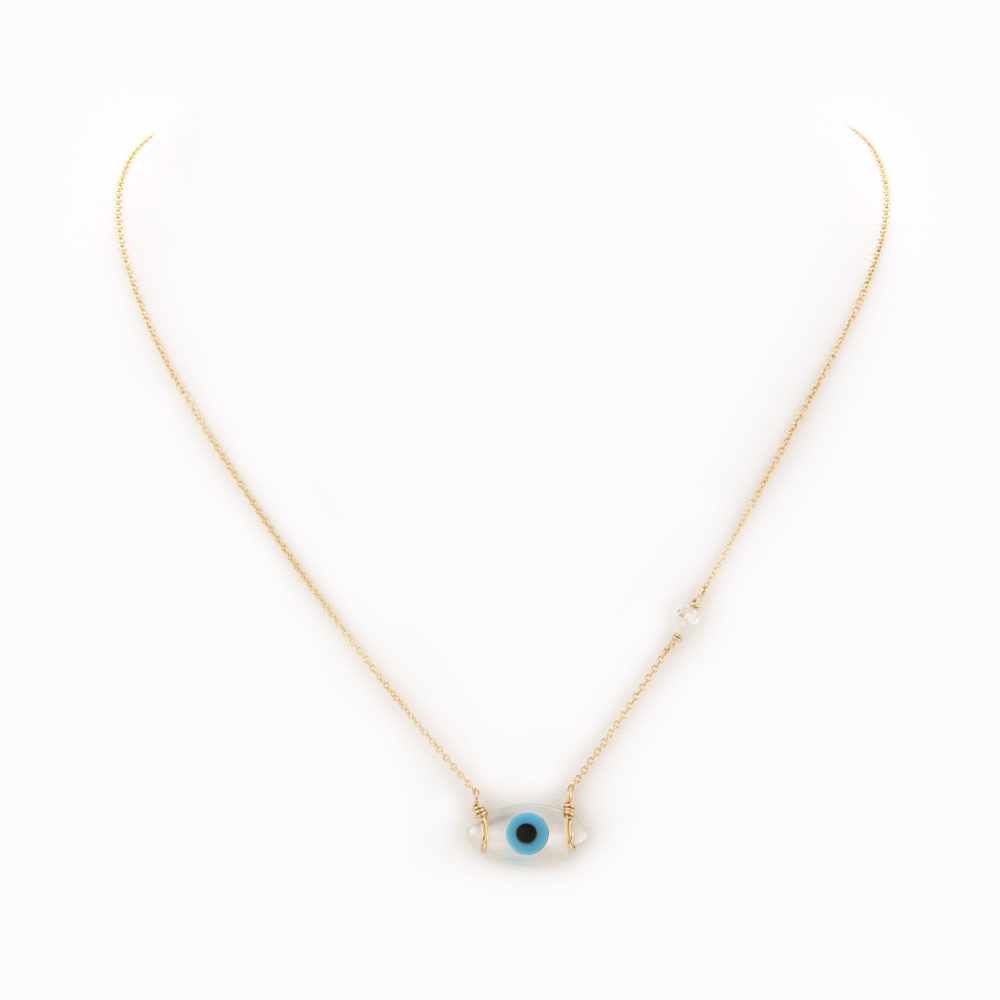 A 14k gold-filled chain necklace with a white mother of pearl evil eye.