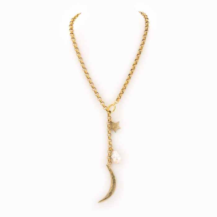 A solid brass rolo chain necklace with an oversized clasp and finshed with a brass moon, star and white pearl.