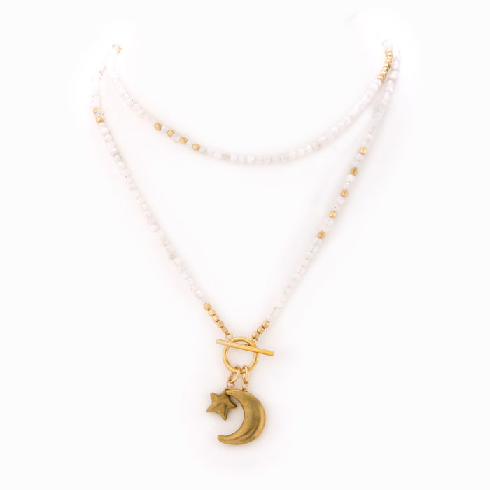 A necklace made of moonstone and 14k gold-filled beads. Finished with brass star and moon charms.