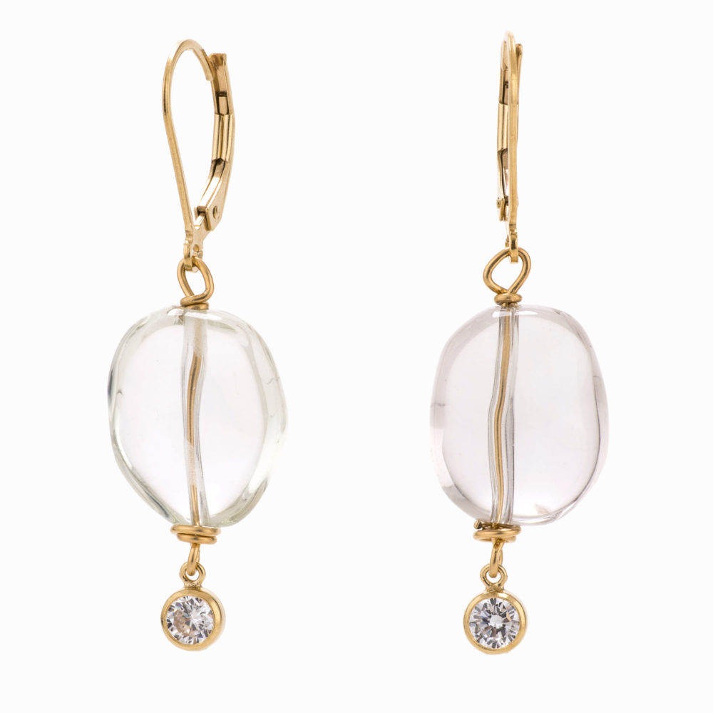 A pair of quartz earrings with 14k gold-filled backs and crystal drops.
