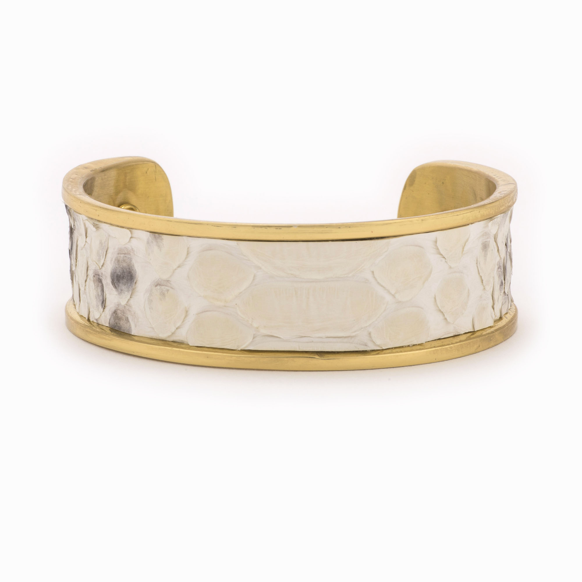 Rear view of a medium gold cuff with black and white colored snakeskin pattern inlaid.