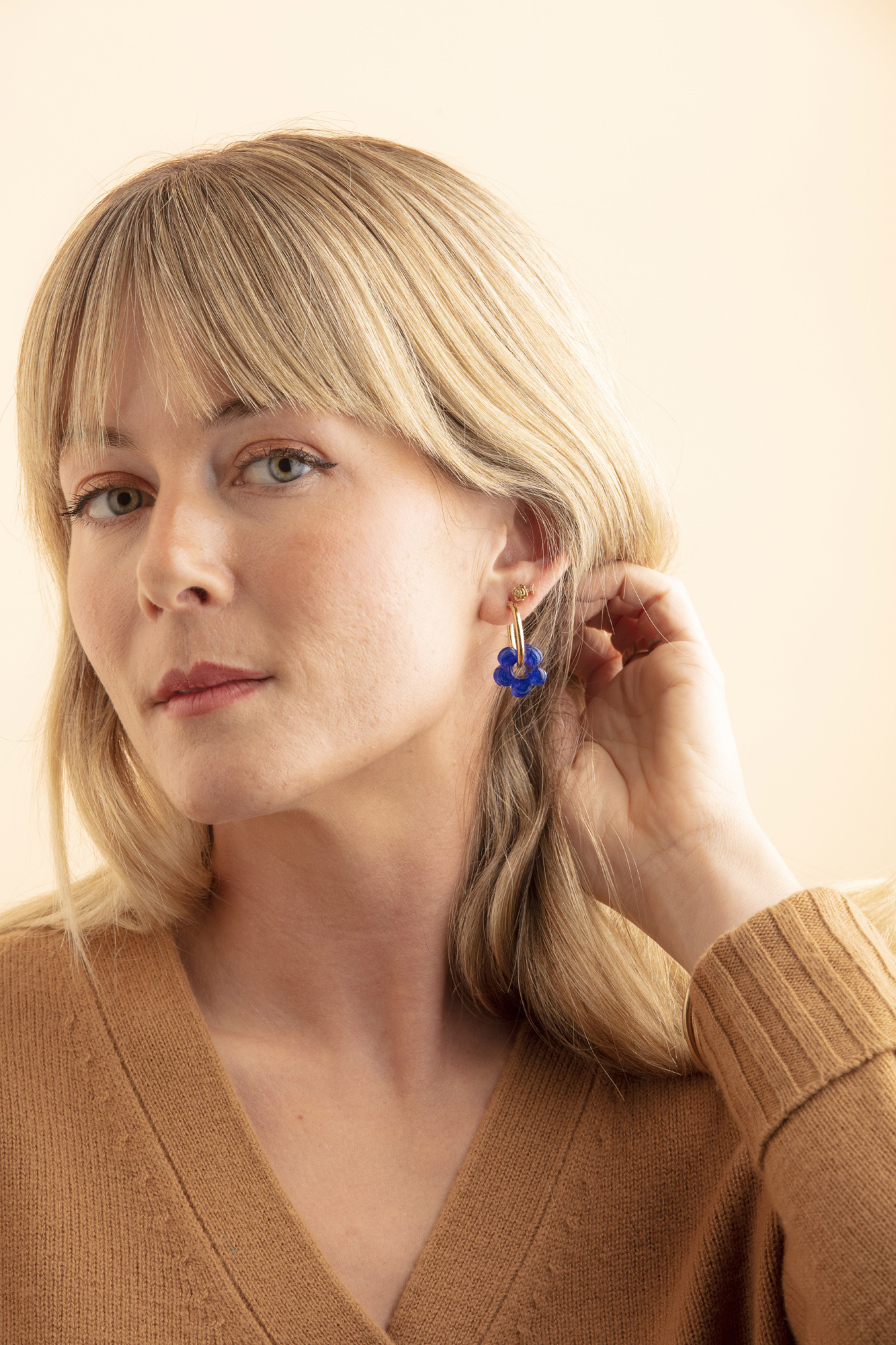 Featured image for “Flower Power Gold Earrings In Royal Blue”