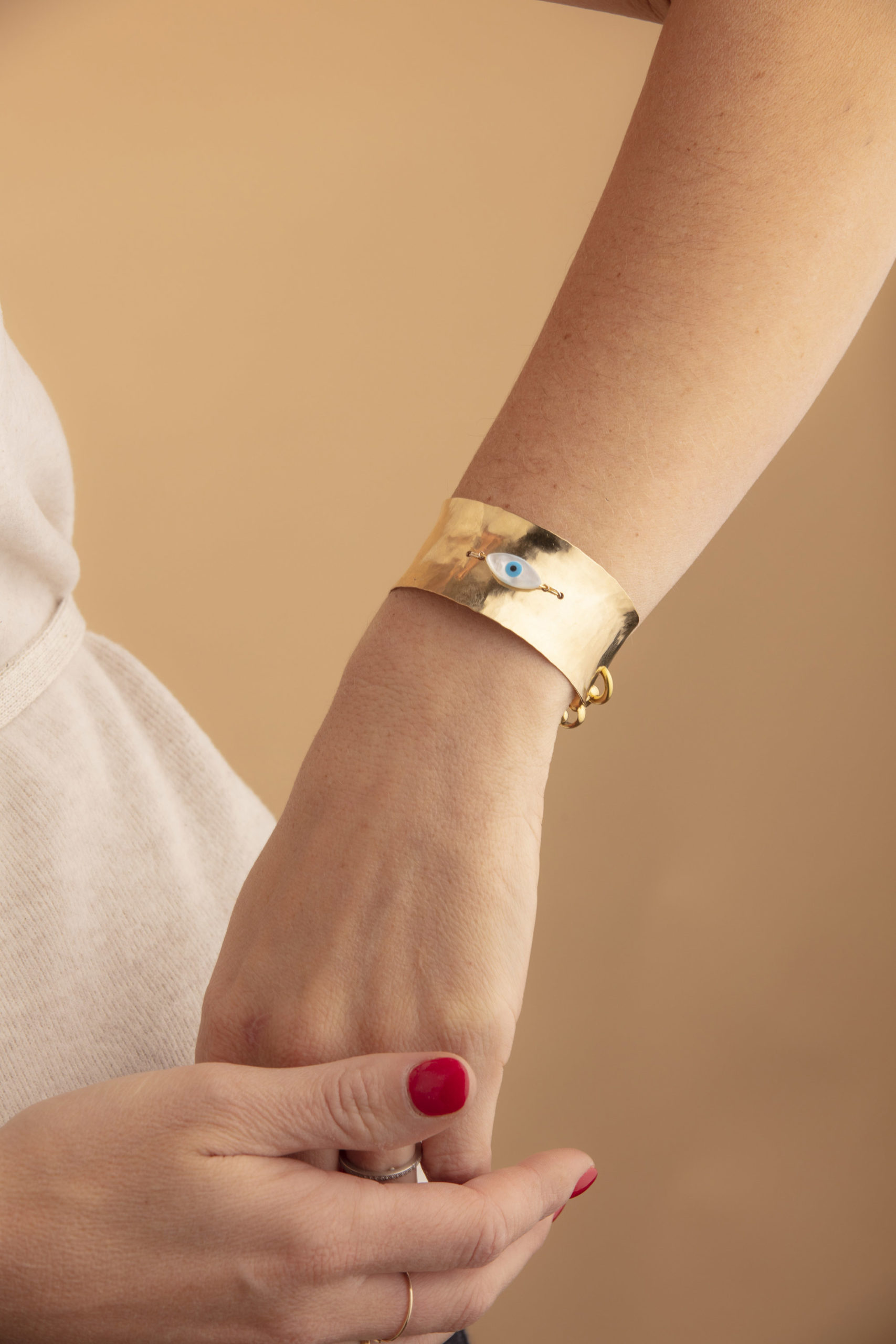 Featured image for “Intella Hammered Gold Cuff”