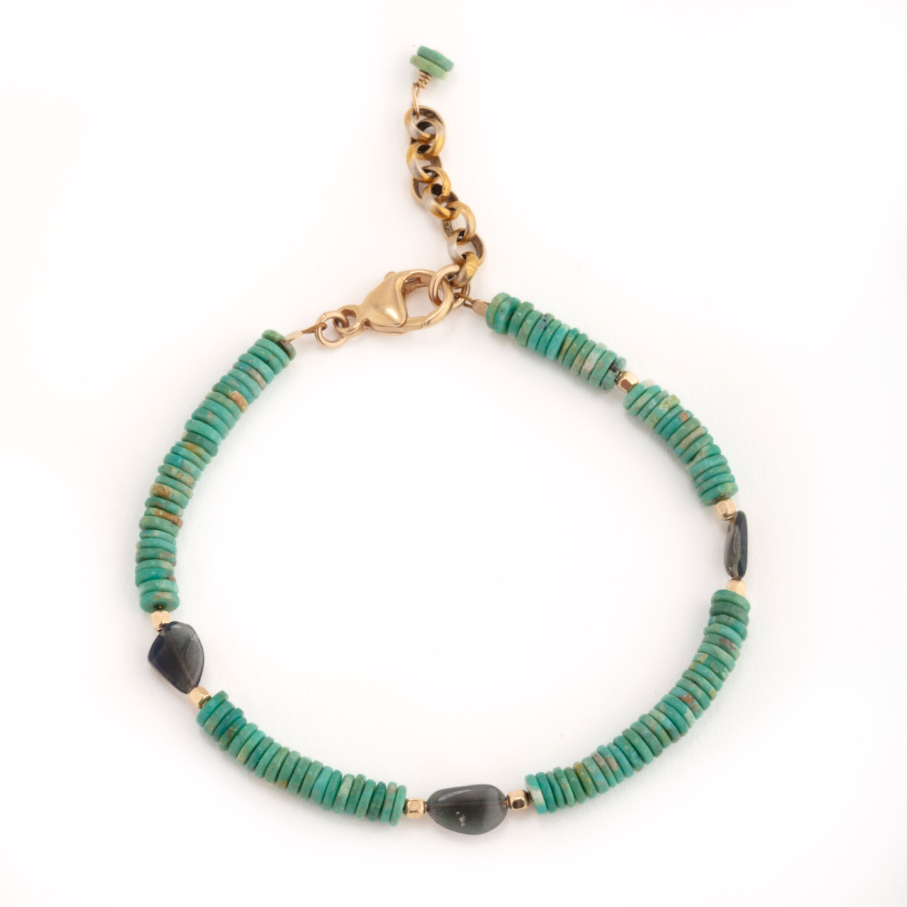 Celestial Harmony Bracelet. An exquisite bracelet showcasing vibrant turquoise beads and stunning opal accents.